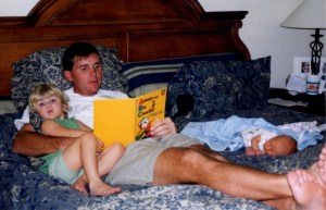 My husband as father with his two little children.